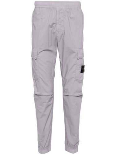 Pantalon fuselé à poches cargo - Stone Island - Modalova