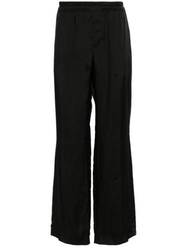 Pantalon droit à fini satiné - Saint Laurent - Modalova