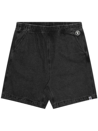 Short en jean à appliqué Moonface - AAPE BY *A BATHING APE® - Modalova