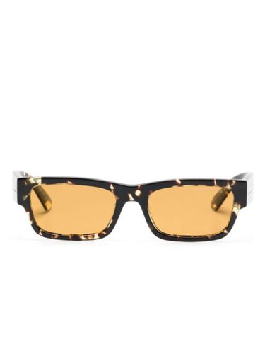 Lunettes de soleil à effet écailles de tortue - Prada Eyewear - Modalova