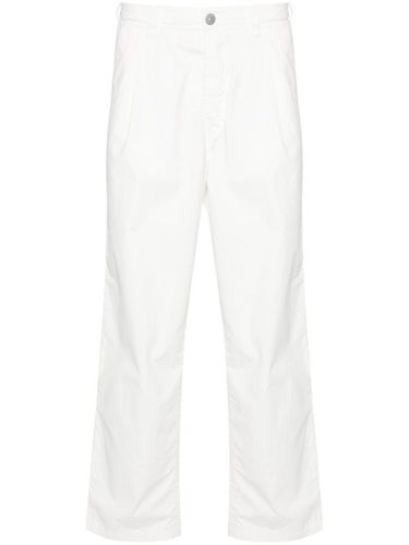 Pantalon à logo imprimé - Stone Island - Modalova