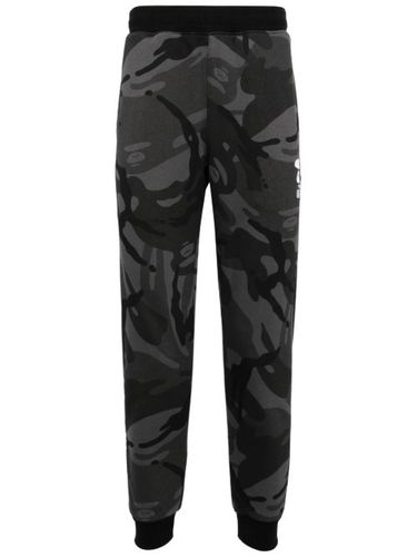 Pantalon de jogging fuselé à motif camouflage - AAPE BY *A BATHING APE® - Modalova