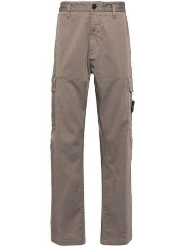 Pantalon fuselé à poches cargo - Stone Island - Modalova