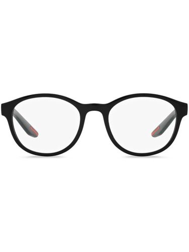 Lunettes de vue PS 07PV à monture ronde - Prada Linea Rossa - Modalova