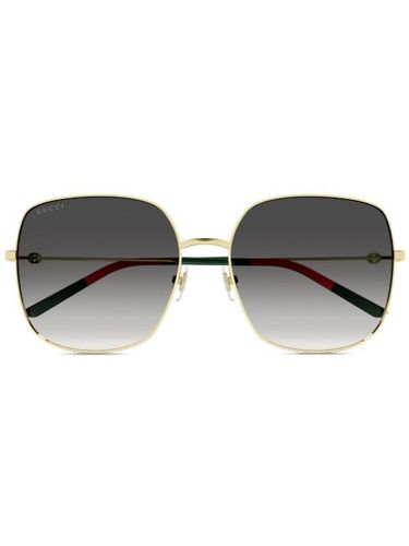 Lunettes de soleil à monture carrée - Gucci Eyewear - Modalova