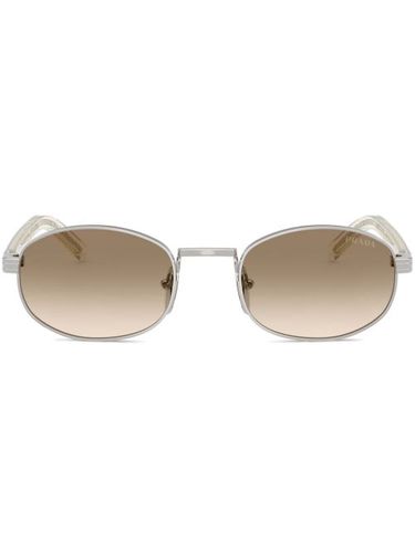 Lunettes de soleil à monture ronde - Prada Eyewear - Modalova