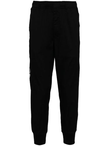Pantalon chino à patch logo - AAPE BY *A BATHING APE® - Modalova