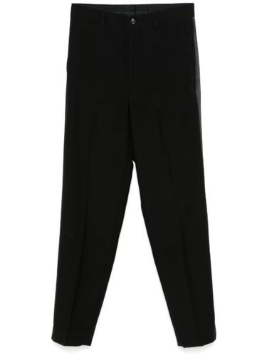 Kei Ninomiya pantalon de costume en coton mélangé - Noir Kei Ninomiya - Modalova
