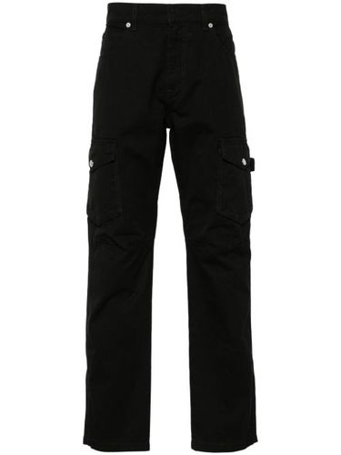 Pantalon fuselé à patch logo - Balmain - Modalova