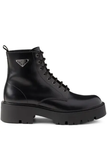 Bottines en cuir à plaque logo - Prada - Modalova