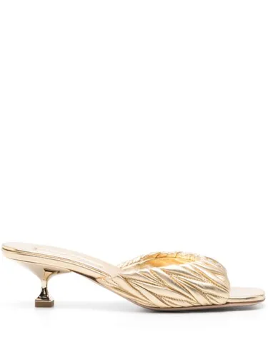 Mules à effet matelassé 60 mm - Miu Miu - Modalova