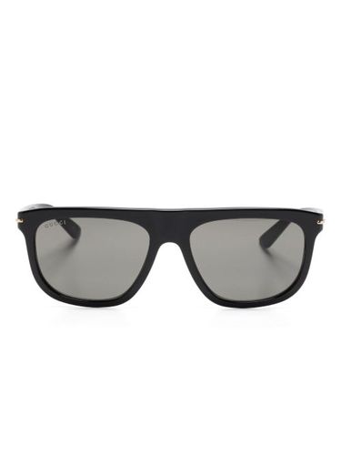 Lunettes de soleil à monture ovale - Gucci Eyewear - Modalova