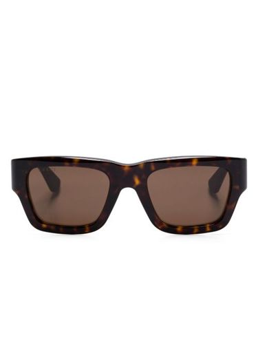 Lunettes de soleil à monture rectangulaire - Gucci Eyewear - Modalova
