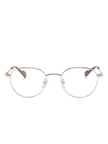 Lunettes à monture ronde - Gucci Eyewear - Modalova