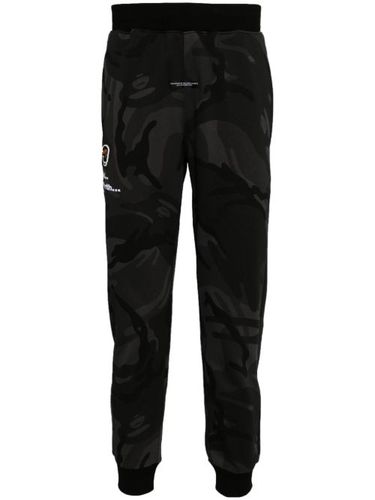 Pantalon de jogging à logo brodé - AAPE BY *A BATHING APE® - Modalova