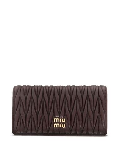 Portefeuille à design matelassé - Miu Miu - Modalova