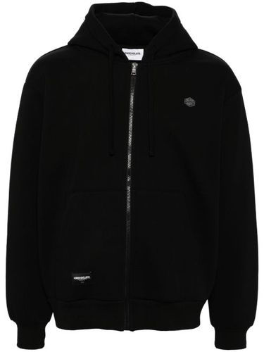 Hoodie zippé à patch logo - CHOCOOLATE - Modalova