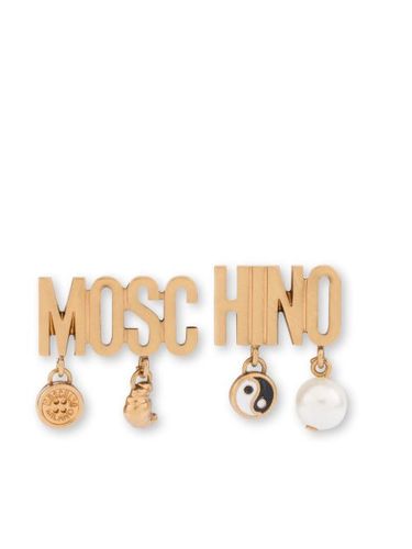 Moschino puces d'oreilles à logo - Moschino - Modalova