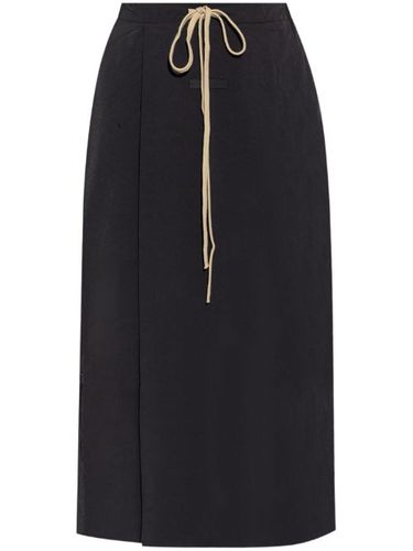 Jupe mi-longue à design portefeuille - FEAR OF GOD ESSENTIALS - Modalova