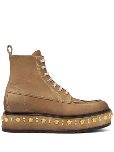 Bottines à détails de clous sur la semelle - Versace - Modalova