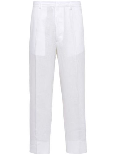 Pantalon en lin à coupe fuselée - Prada - Modalova