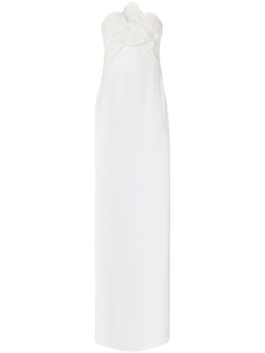 Robe longue à appliques fleurs - Genny - Modalova