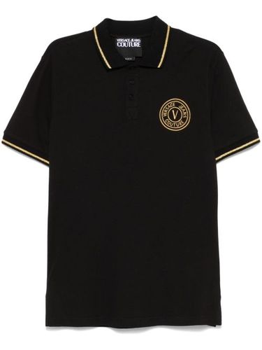 Polo à logo brodé - Versace Jeans Couture - Modalova
