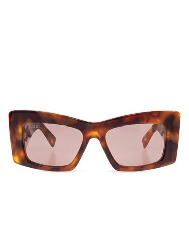Lunettes de soleil à plaque logo - Gucci Eyewear - Modalova