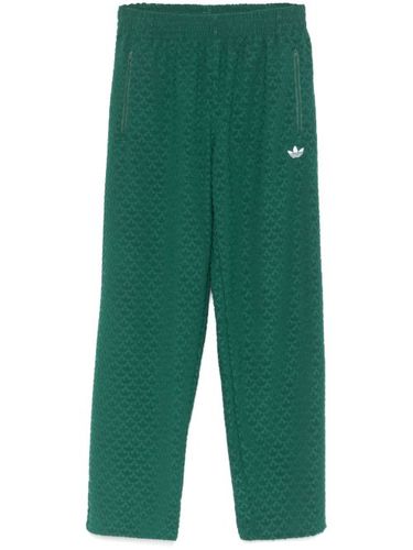 Pantalon de jogging à motif monogrammé - adidas - Modalova