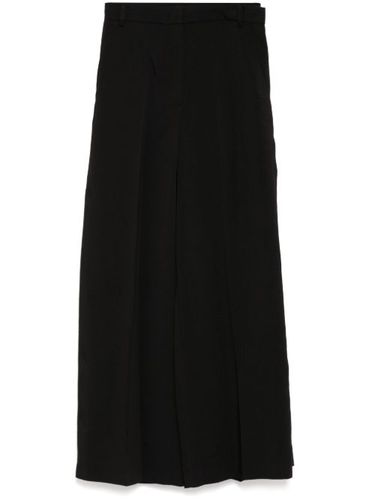 Pantalon ample à détail de rabat - pushBUTTON - Modalova