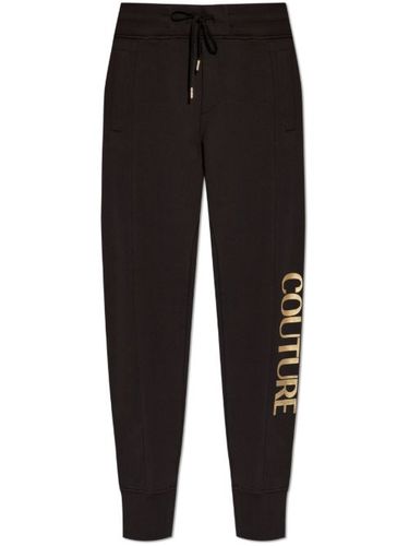 Pantalon de jogging à imprimé graphique - Versace Jeans Couture - Modalova