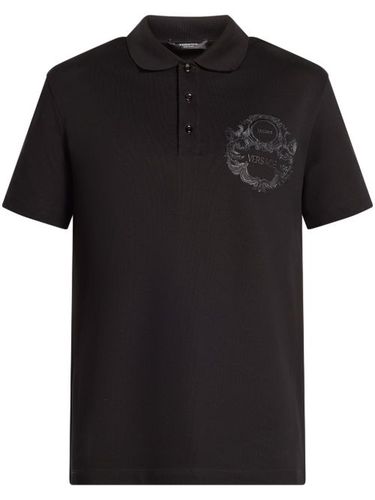 Versace polo à logo brodé - Noir - Versace - Modalova