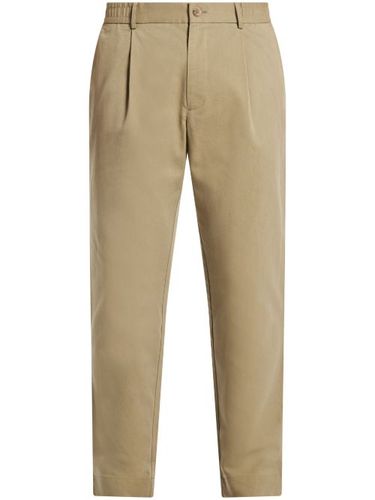 Pantalon chino à design plissé - CHÉ - Modalova