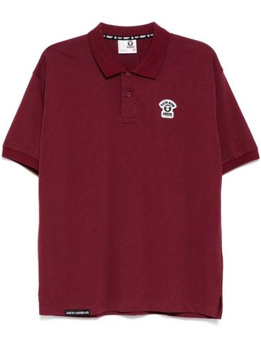 Polo à logo Moonface - AAPE BY *A BATHING APE® - Modalova