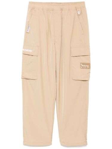 Pantalon cargo à logo Moonface - AAPE BY *A BATHING APE® - Modalova