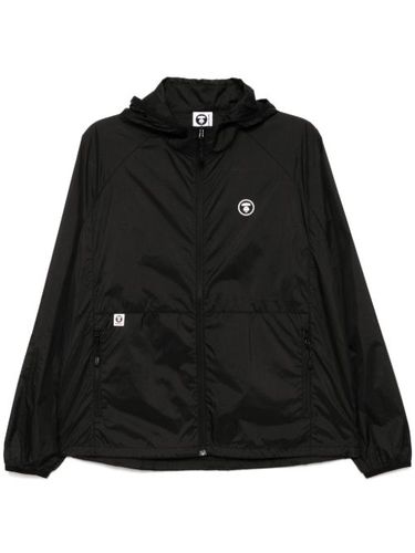 Coupe-vent à logo Moonface - AAPE BY *A BATHING APE® - Modalova