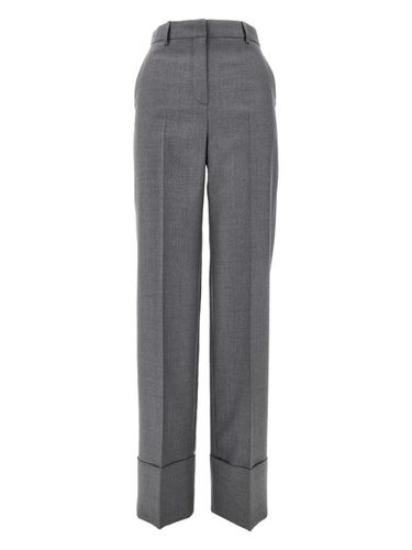 Pantalon de costume en laine vierge - Valentino Garavani - Modalova