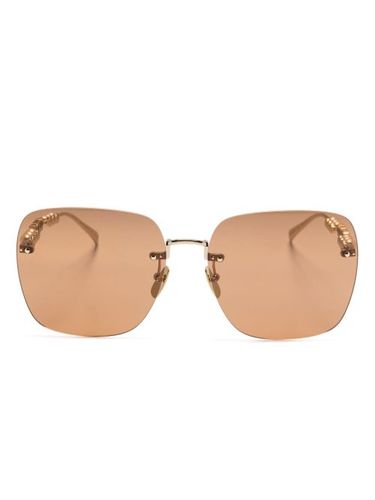 Lunettes de soleil à monture carrée - Gucci Eyewear - Modalova