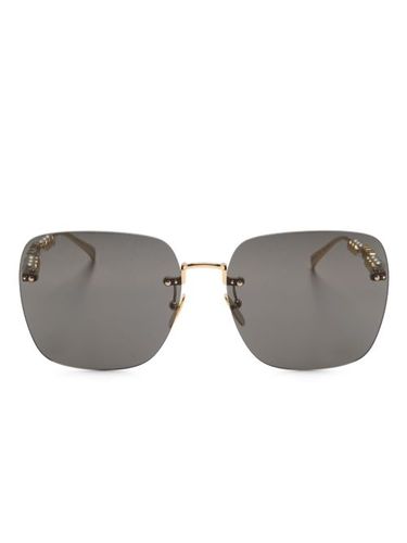Lunettes de soleil à monture carrée - Gucci Eyewear - Modalova