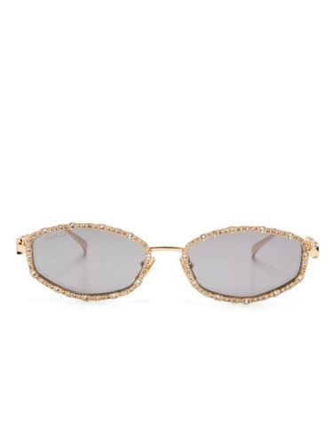 Lunettes de soleil à monture ovale - Gucci Eyewear - Modalova
