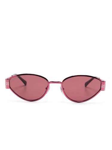 Lunettes de soleil à monture ovale - Gucci Eyewear - Modalova