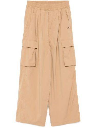 Pantalon ample à poches cargo - CHOCOOLATE - Modalova