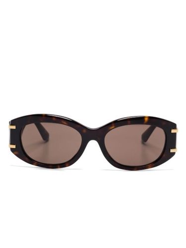 Lunettes de soleil à plaque logo DG - Dolce & Gabbana Eyewear - Modalova