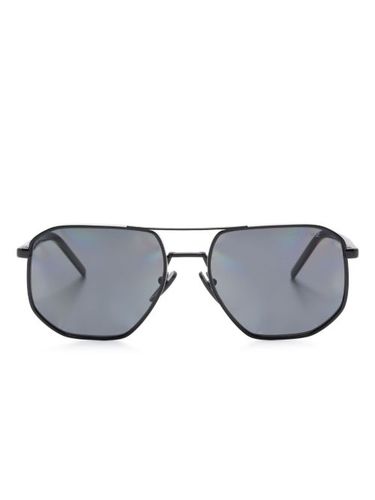 Lunettes de soleil à monture géométrique - Prada Eyewear - Modalova