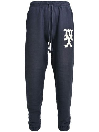 Pantalon de jogging à imprimé graphique - SAINT MXXXXXX - Modalova