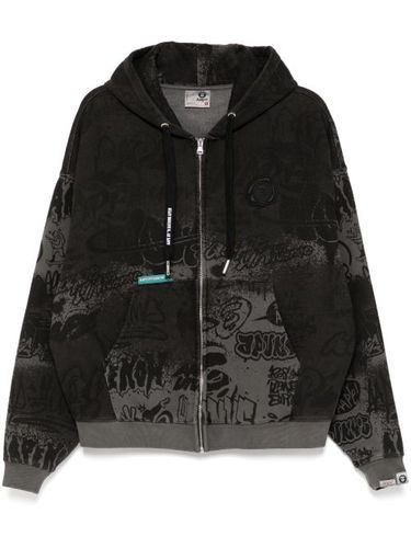 Hoodie zippé à imprimé graffiti - AAPE BY *A BATHING APE® - Modalova