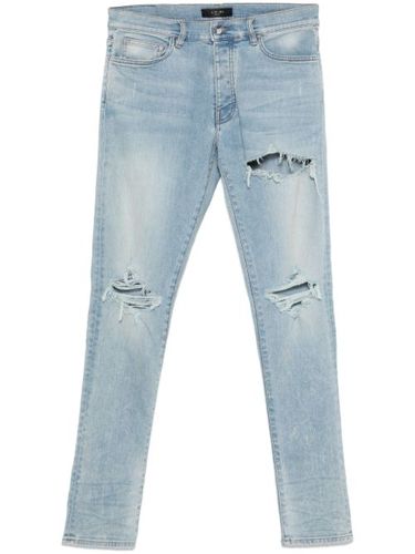 AMIRI jean à effet usé - Bleu - AMIRI - Modalova