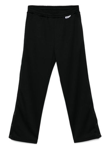 Pantalon de jogging à boutons décoratifs - GCDS - Modalova