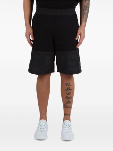 GCDS short de sport en coton - Noir - GCDS - Modalova