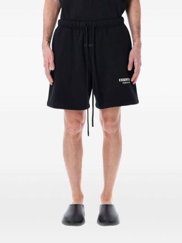 Short de sport en polaire - FEAR OF GOD ESSENTIALS - Modalova
